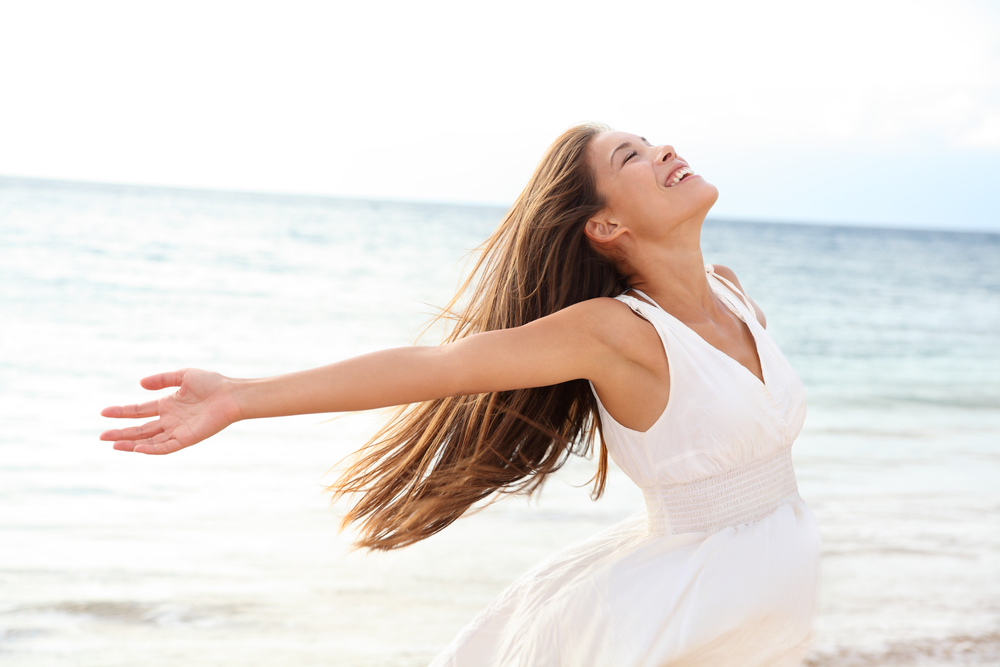 A carefree woman on the beach